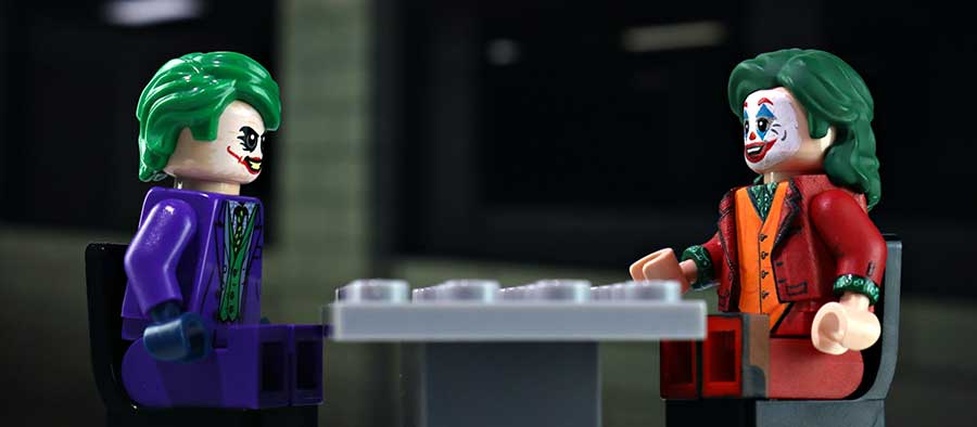 Joker-(2019)-&-The-Dark-Knight-Heath-Ledger-Joker-Interrogation-Room-(Cropped)